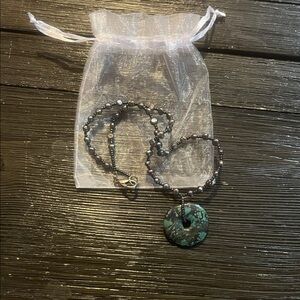 Elegant Beaded Necklace with Turquoise Pendant